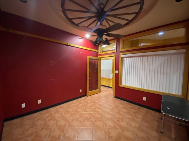 Empty room with baseboards and ceiling fan | Image 12