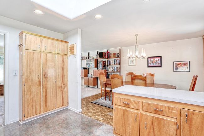 Kitchen with light floors, light countertops, and recessed lighting | Image 11