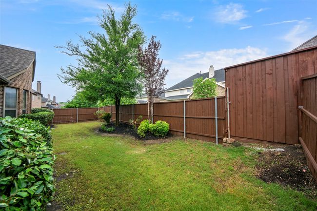 View of yard featuring a fenced backyard | Image 36