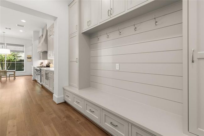 Mud-Room just off the garage w/ drawers, hooks, upper cabinets and side lockers. | Image 26