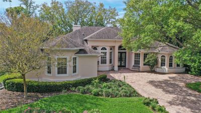 Spacious Pool Home with 5 Bedrooms/3.5 Bathrooms and 2 Car Courtyard Entry Garage | Image 1