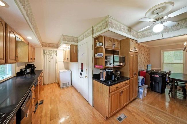 6880 Mark Turner Rd, House other with 3 bedrooms, 3 bathrooms and 8 parking in Lithia springs GA | Image 6