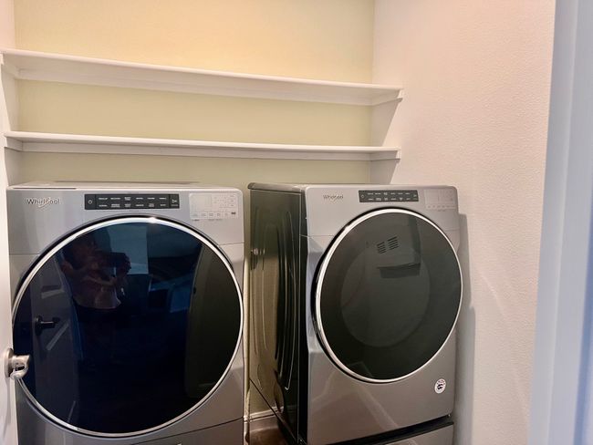 Laundry room with washing machine and dryer | Image 10