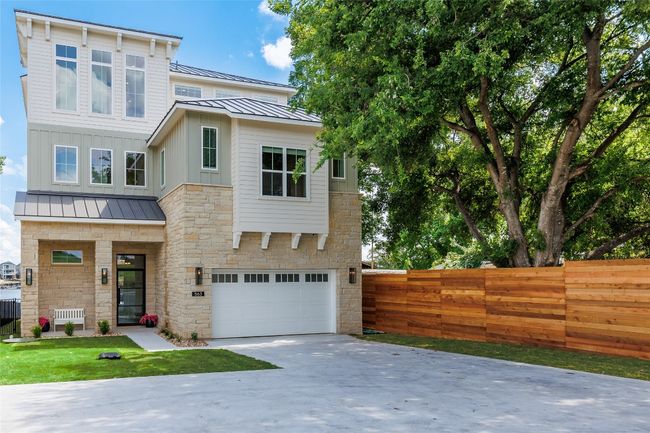View of front of house. Plenty of parking for all. | Image 10