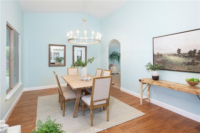 Arched entry to kitchen and family room spaces | Image 11