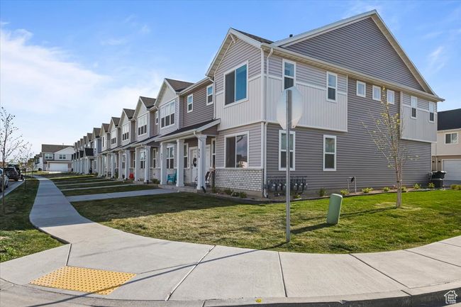 View of home's exterior featuring a residential view and a yard | Image 21