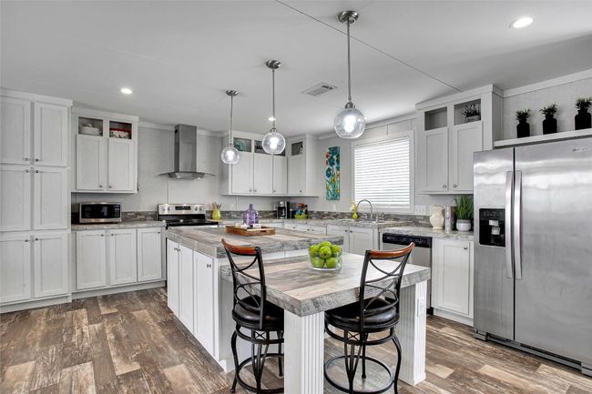 Stainless steel appliances. Refrigerator conveys with the home | Image 9