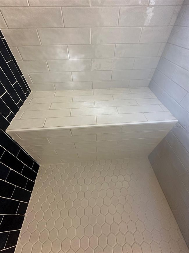 BUILT IN BENCH IN MASTER BATHROOM SHOWER | Image 19