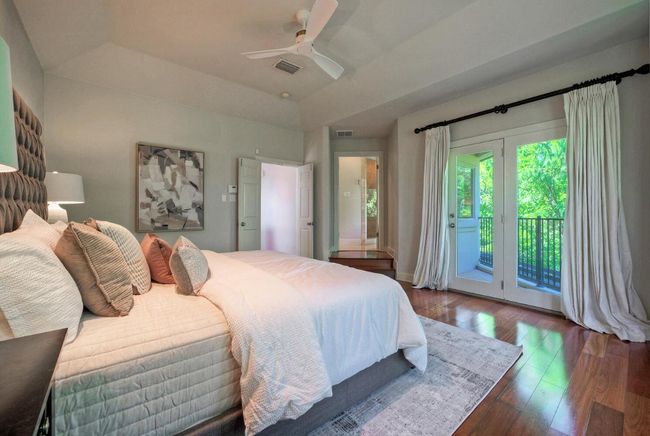 Primary bedroom with private balcony | Image 22