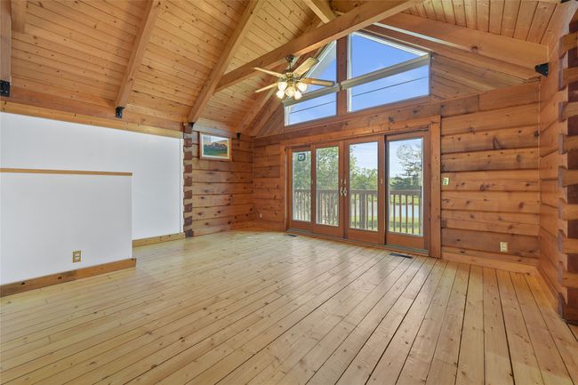 Western Red Cedar logs, Pine Floors. Without Virtual Staging. | Image 6