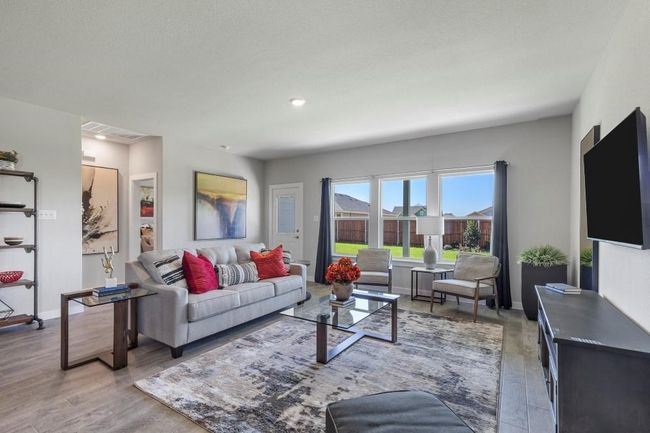Living room - currently carpeted. Virtually staged | Image 12