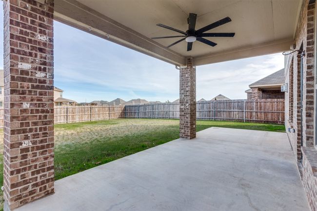 View of patio with ceiling fan | Image 26