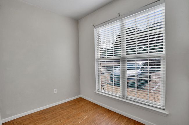 Eat-in kitchen featuring finished floors and baseboards | Image 14