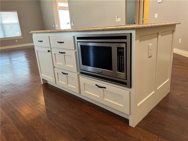 Nice size island with microwave | Image 17