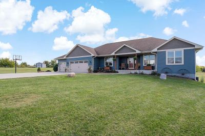 This stunning rambler style home is located on over 3-acres! | Image 3