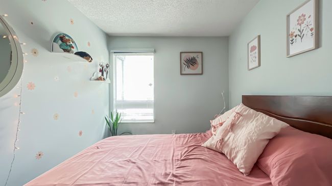 Bedroom with a textured ceiling | Image 15