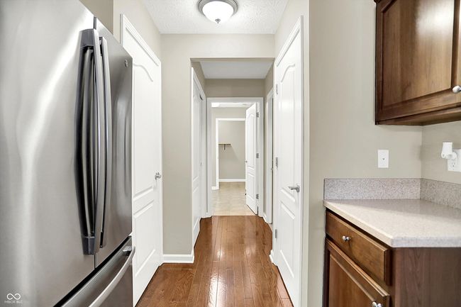 Hallway leads to Laundry Room and Bonus Room | Image 29