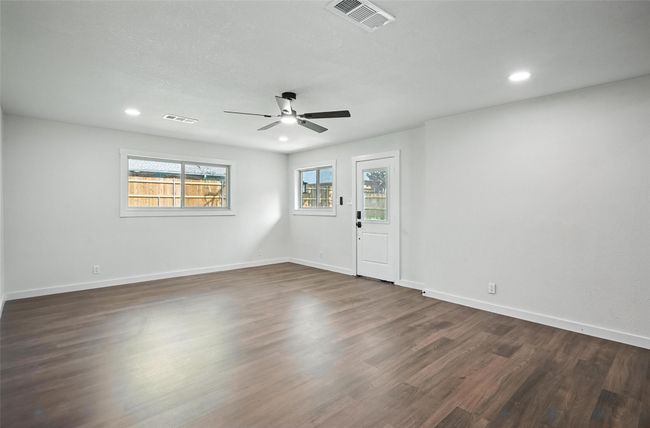 Family Room has a door to enter the back yard. | Image 15