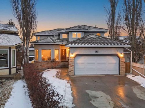 729 Woodbriar Pl Sw, Calgary, AB, T2W5Z2 | Card Image