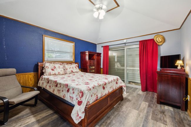 Secondary Bedrooms with Vinyl Plank Flooring and Sliding Doors | Image 29