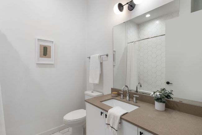 Hall full bathroom with tub and storage! | Image 24
