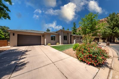 View of front of home with a garage | Image 1