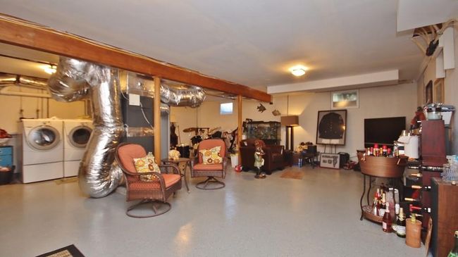 Basement with epoxy floor | Image 29