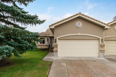 10 Glenmore Green Sw, Home with 4 bedrooms, 3 bathrooms and 2 parking in Calgary AB | Image 2