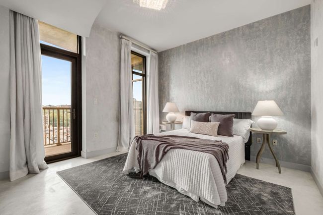 Guest bedroom with panoramic views from the windows and balcony | Image 10