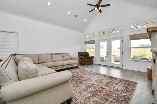 Living room with 15ft vaulted ceilings | Image 25