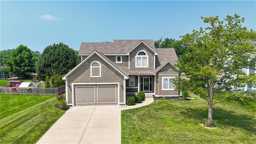 1026 Sutherland Dr, Louisburg, KS, 66053-8409 | Card Image