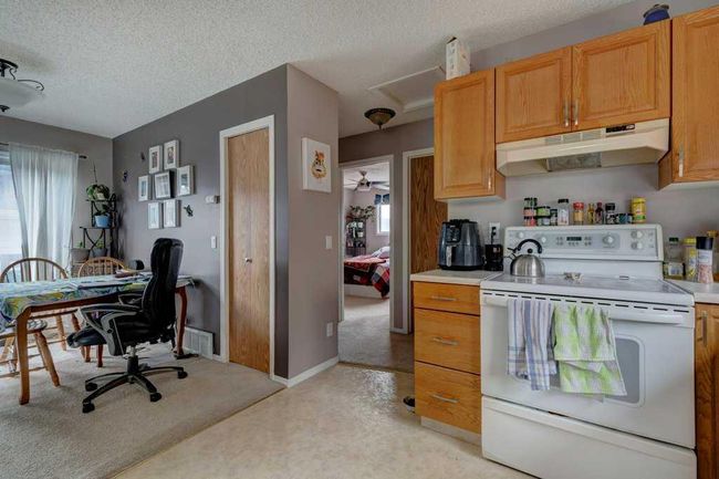 127 Millcrest Way Sw, Home with 4 bedrooms, 2 bathrooms and 2 parking in Calgary AB | Image 10