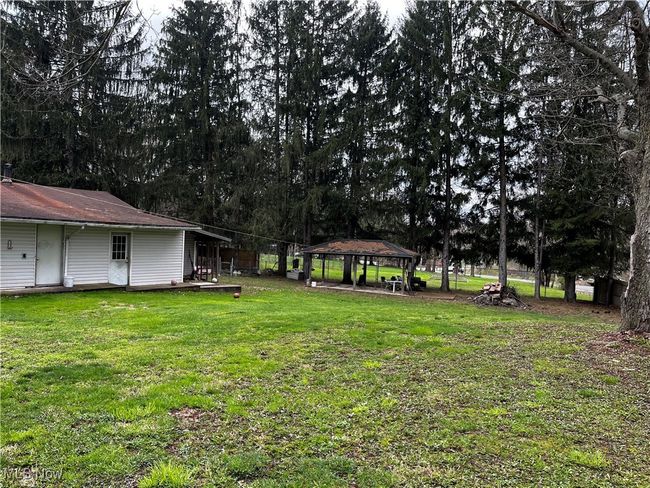View of yard featuring a gazebo | Image 20