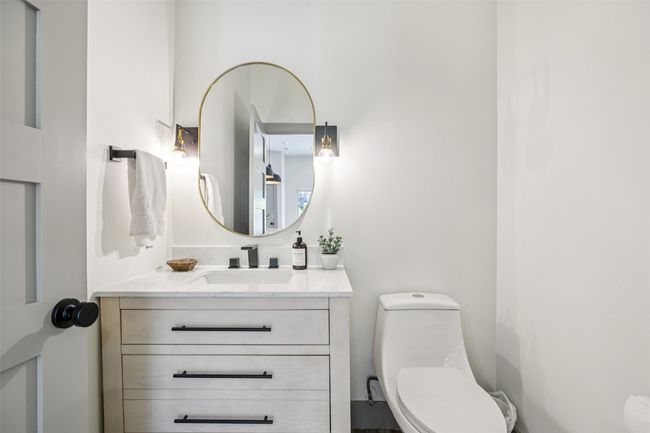 Half bath featuring vanity and toilet | Image 10