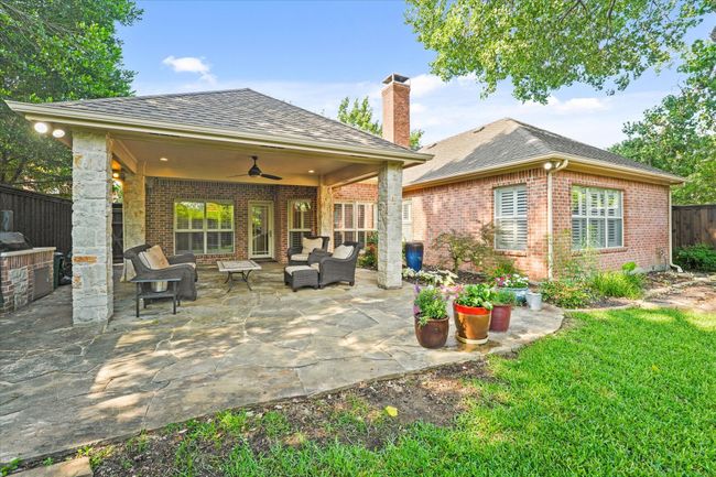 View of patio / terrace featuring a ceiling fan and outdoor lounge area | Image 31