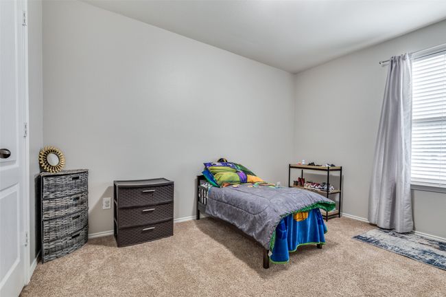 1st carpeted bedroom upstairs. | Image 10
