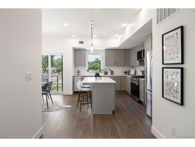 8408 W 52 Nd Ave, Townhouse with 2 bedrooms, 3 bathrooms and null parking in Arvada CO | Image 6