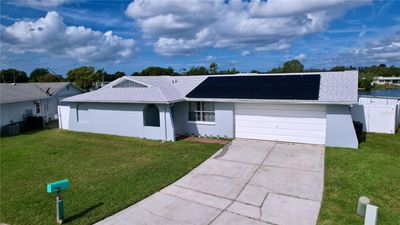 3737 Baden Drive, House other with 4 bedrooms, 3 bathrooms and null parking in Holiday FL | Image 2