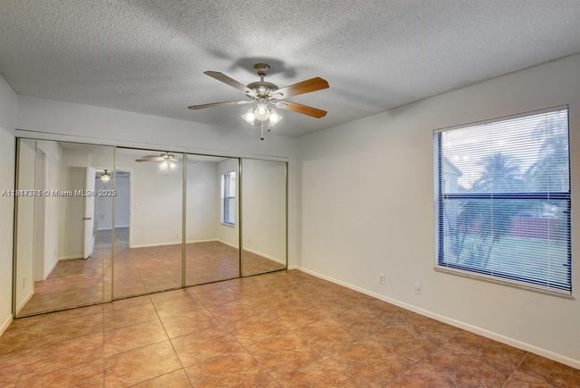 E - 28 Crossings Cir, Condo with 2 bedrooms, 2 bathrooms and null parking in Boynton Beach FL | Image 7