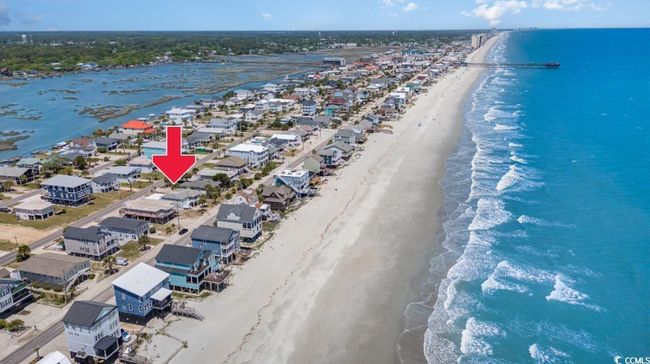 Birds eye view of property with a water view and a beach view | Image 38