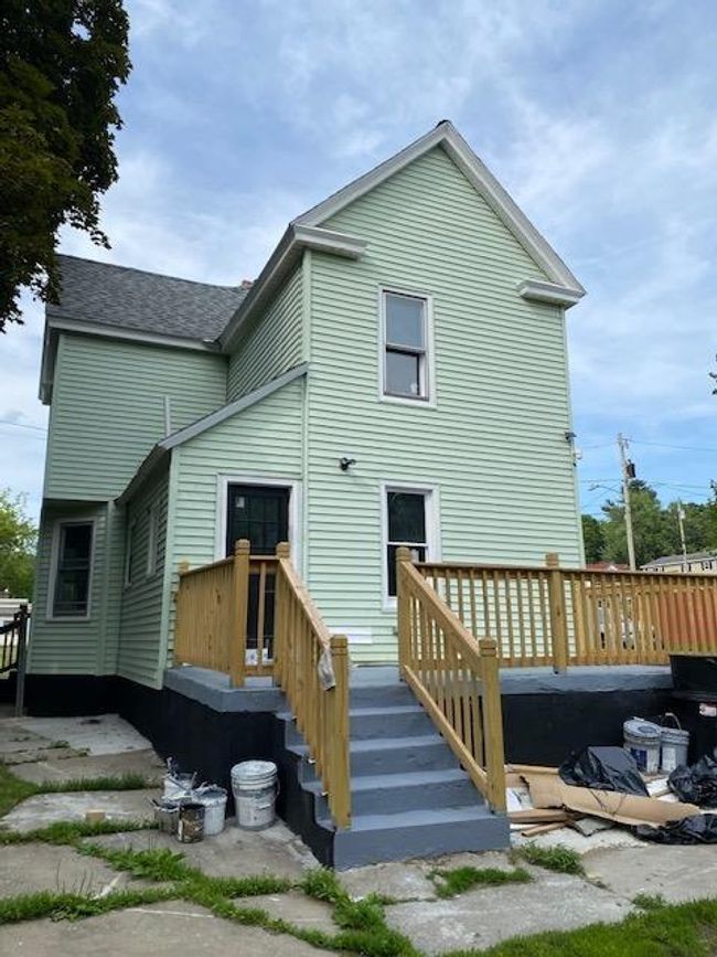Back of property with a deck | Image 7