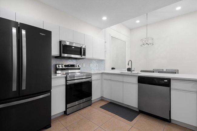 10705 Pelican Dr, Condo with 2 bedrooms, 2 bathrooms and null parking in West Palm Beach FL | Image 7