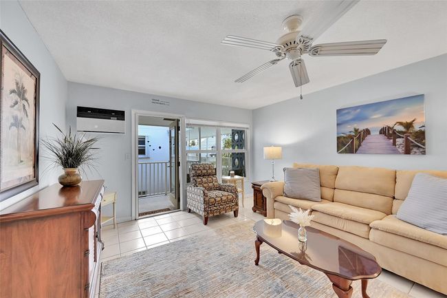 Retractable Screen Doors Shown Here are included in Your Living Room and Kitchen for a No Bug Zone. Can you feel the South Florida Breeze Already? | Image 30