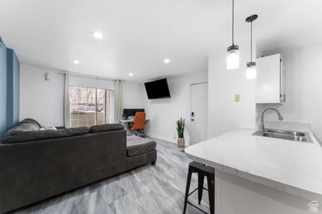 Living area featuring a desk and recessed lighting | Image 5