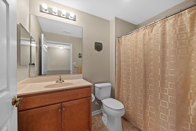 A third full bathroom upstairs is much appreciated for guests or anyone who is upstairs working or relaxing. | Image 32