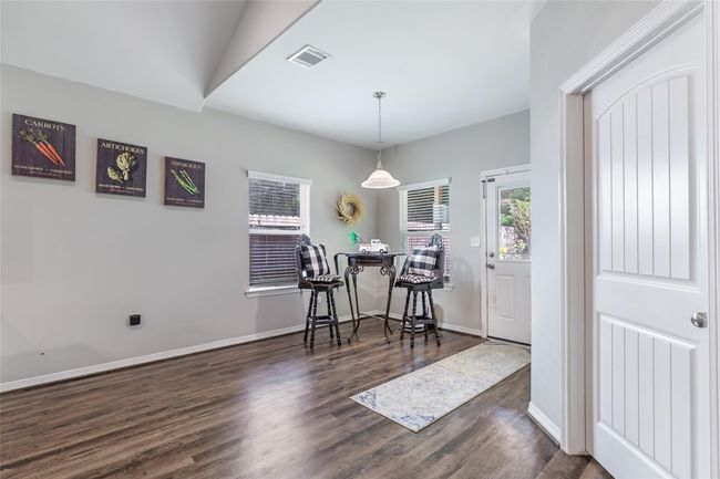Breakfast nook the leads to private patio. | Image 13
