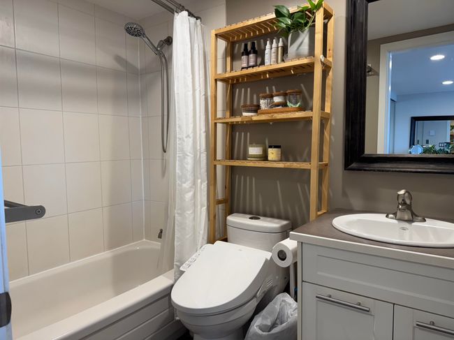 Full bathroom featuring vanity, toilet, and shower / bath combo | Image 15