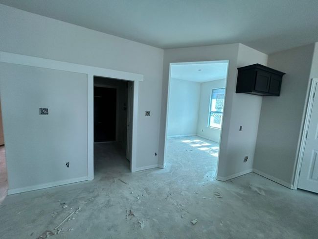 Spare room featuring baseboards | Image 5