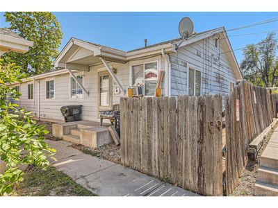 925 S Quitman St, Townhouse with 3 bedrooms, 2 bathrooms and null parking in Denver CO | Image 1