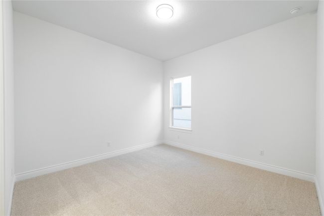 Unfurnished room featuring light colored carpet and baseboards | Image 13